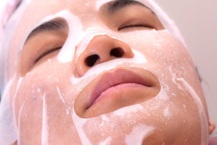 woman getting facial peel