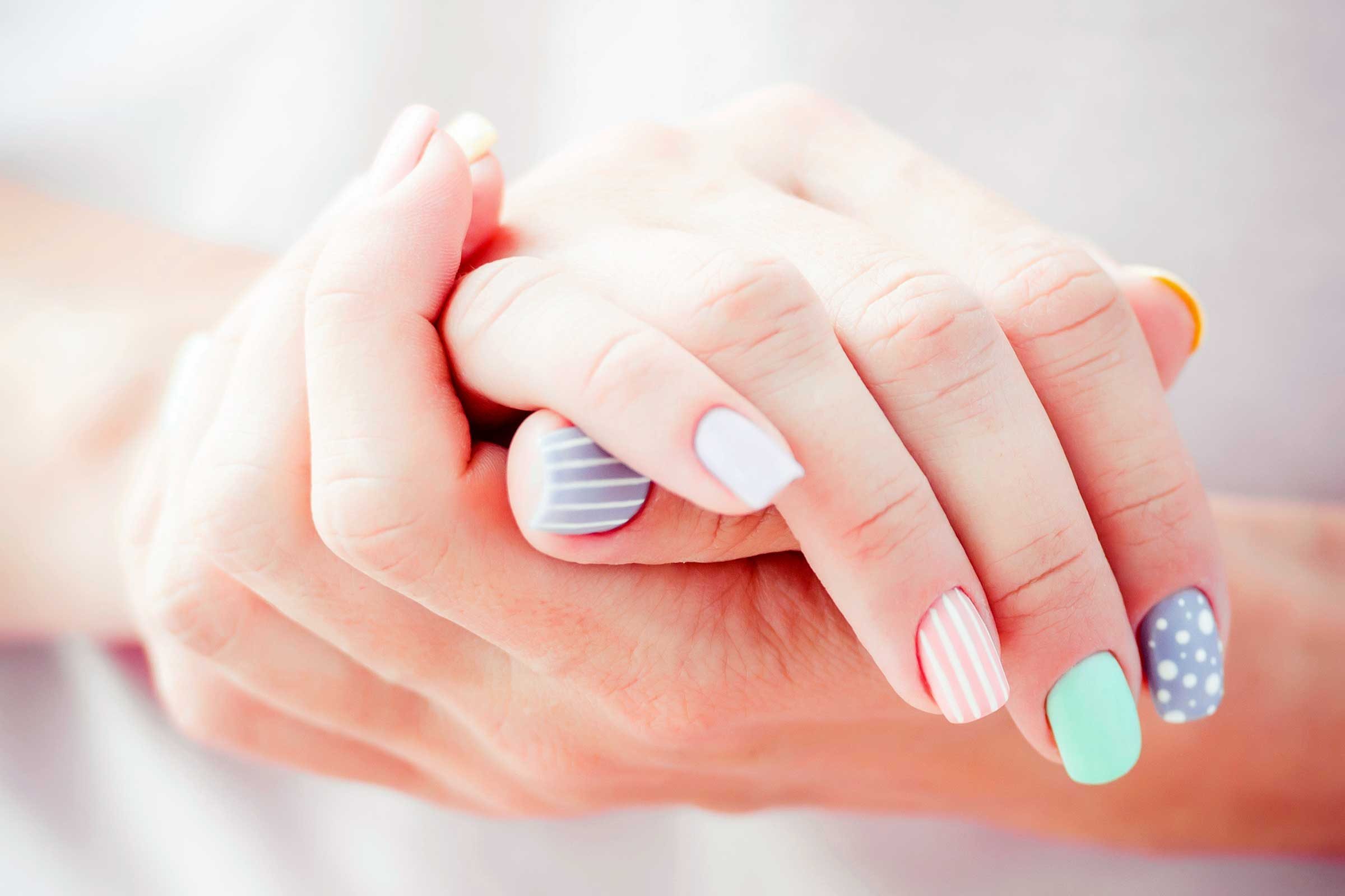 woman with extravagant manicured nails