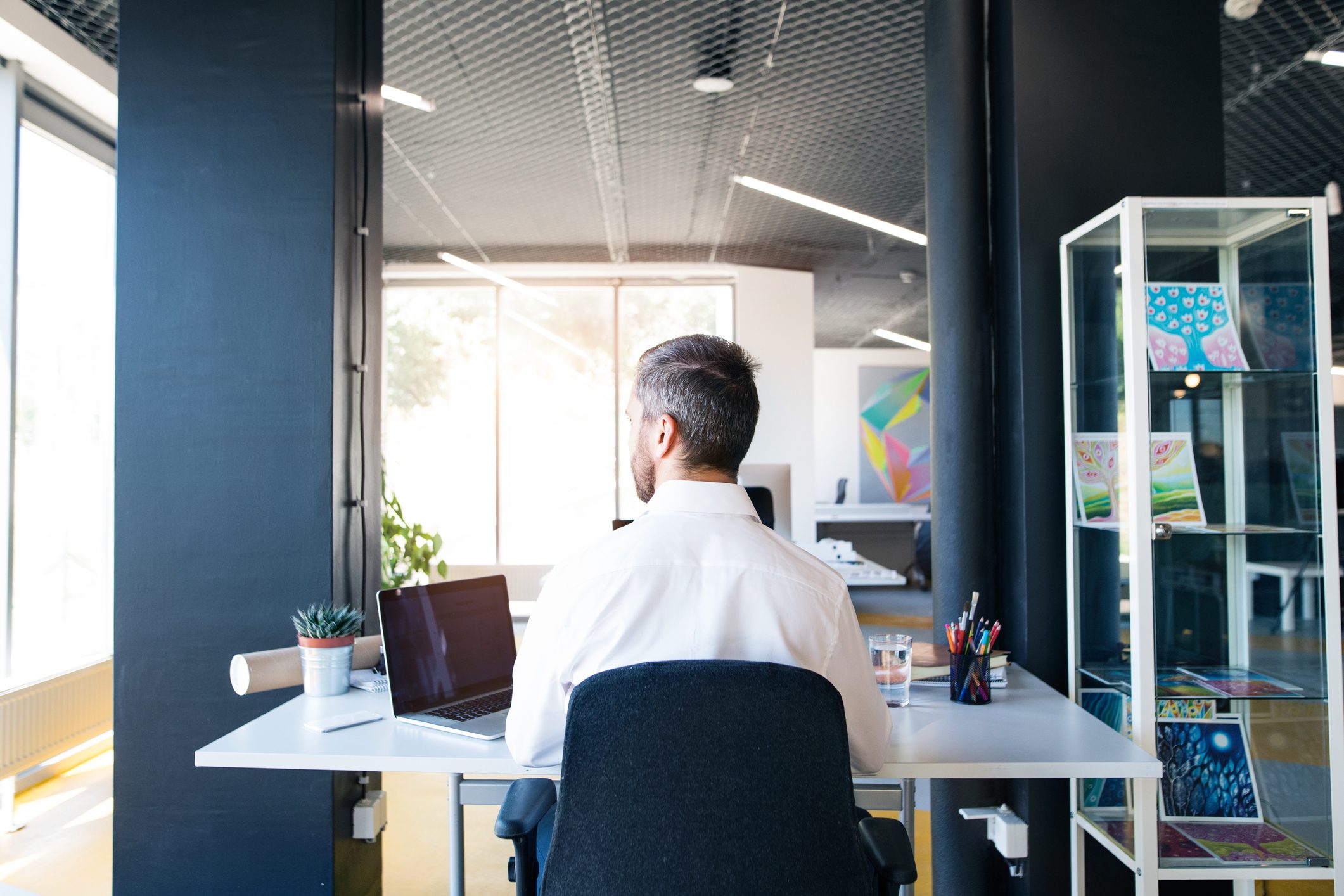 businessman sitting at desk working