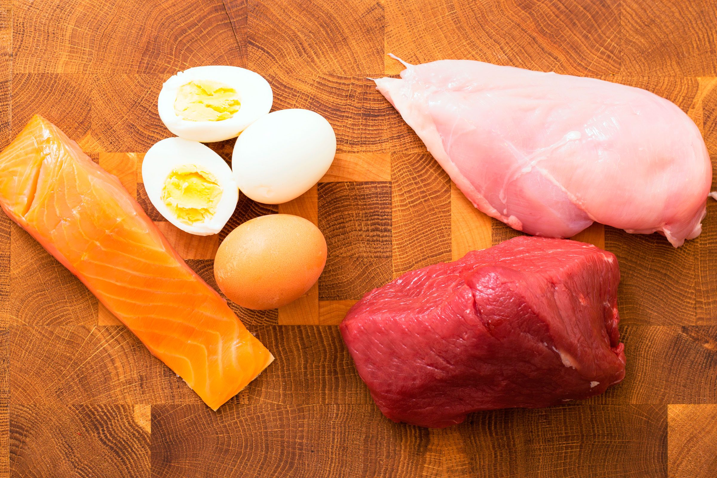 raw salmon, chicken, and beef; hard-boiled eggs