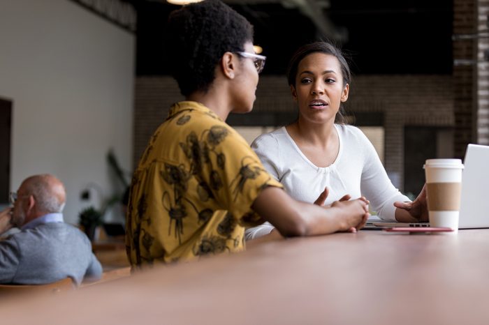 two women friends talking