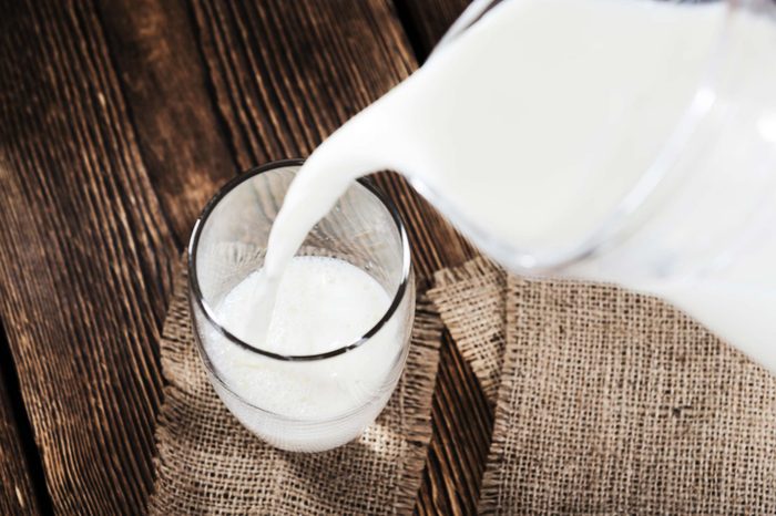 Pouring a glass of milk