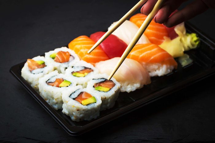 Plate of sushi including California rolls