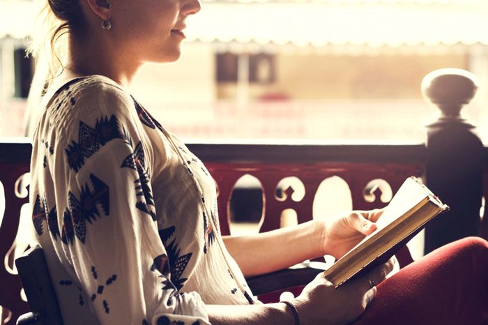 woman reading book