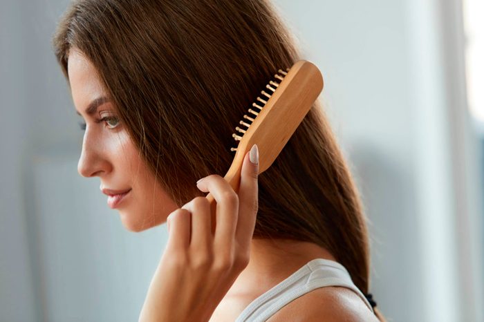 woman brushing hair