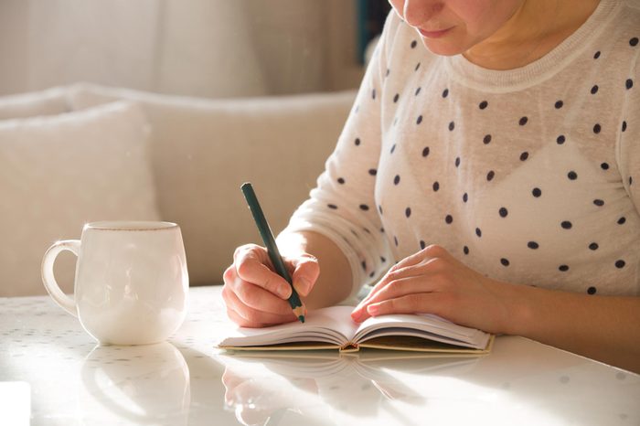 woman writing notes