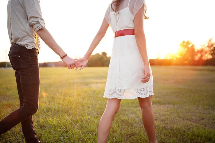 couple holding hands relationship