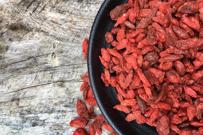 Goji berries in a black bowl