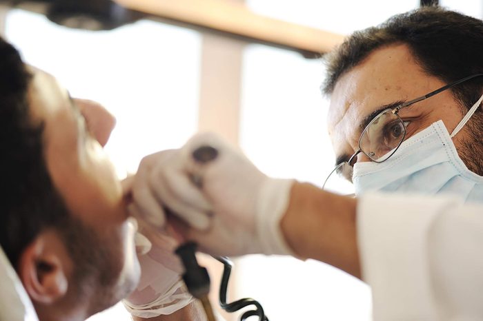 Dentist working on a patient's teeth