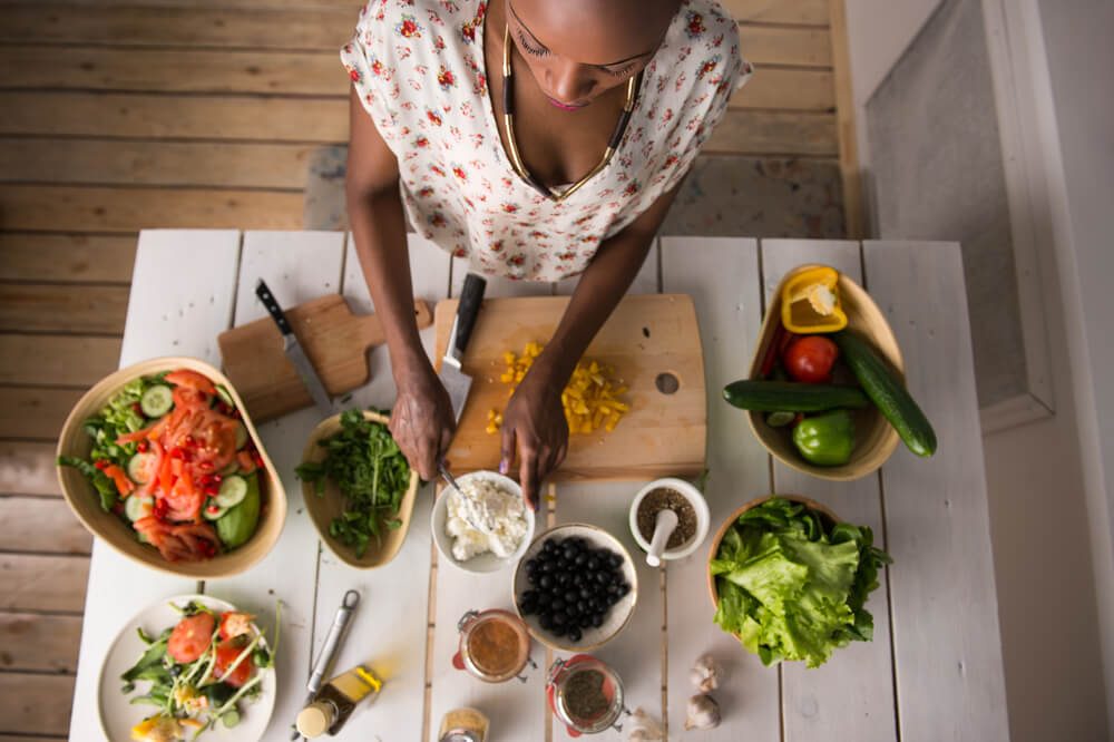 Woman preparing fresh vegetables