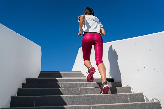 woman-running-up-stairs