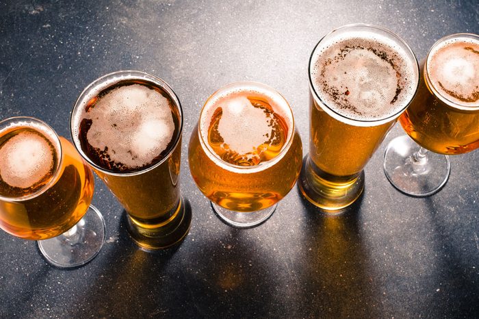 Beer glasses on dark table