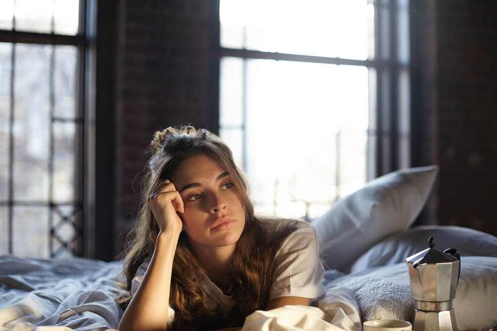 woman lying in bed