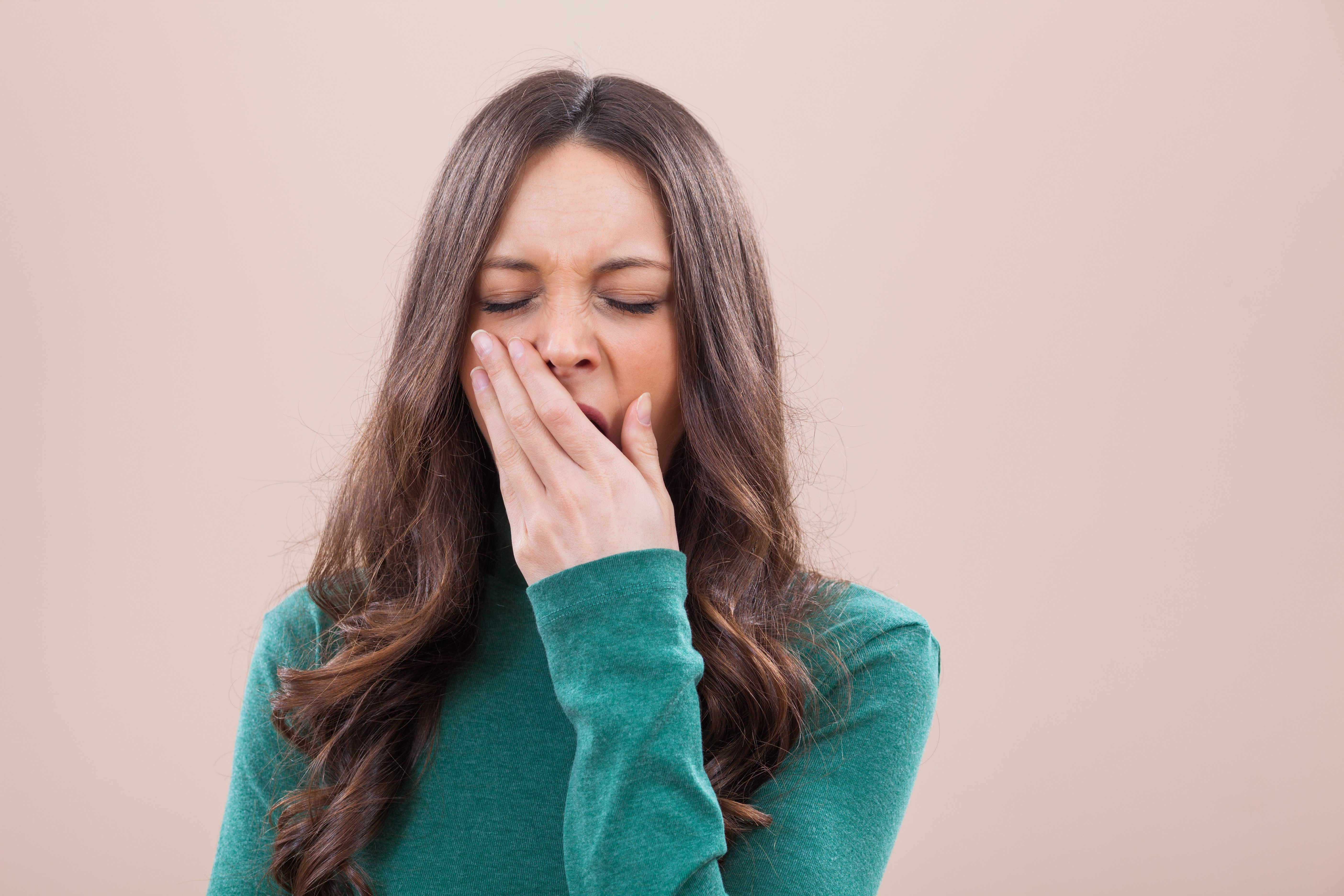 portrait woman yawning tired