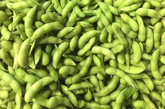 Pile of green soybeans, also called edamame beans. 