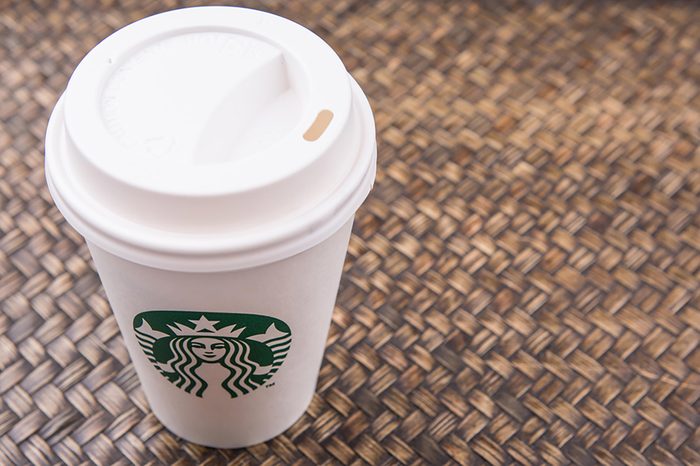 Starbucks coffee to-go cup over wicker background