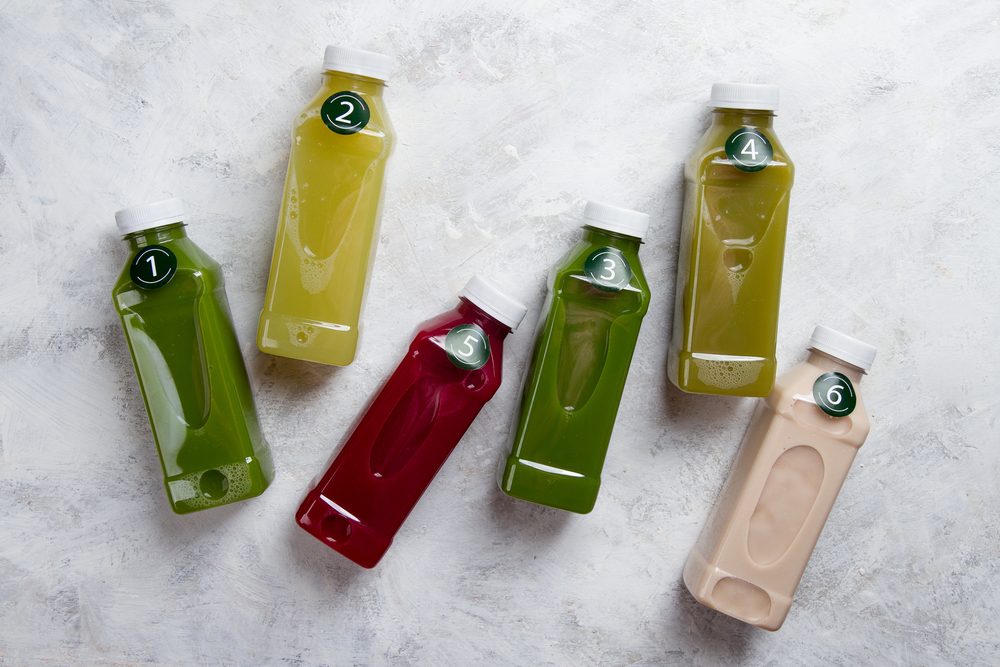 plastic bottles of detox juices