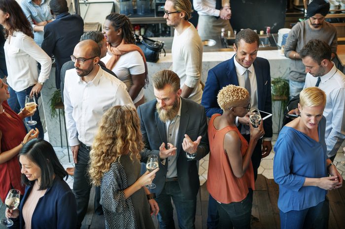 Business people mingling at a party