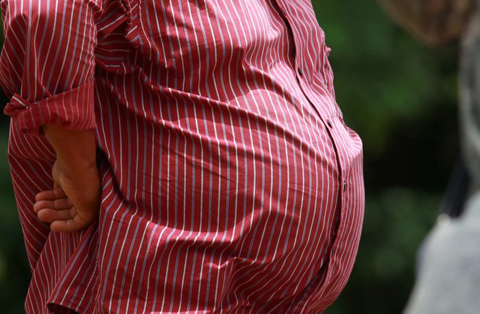 close up On pot-bellied of overweight man