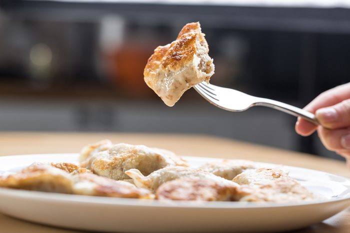 A forkful of tasty fried dumplings