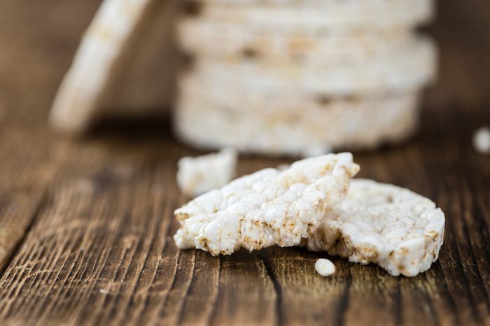 Old wooden table with Rice Cakes (detailed close-up shot)