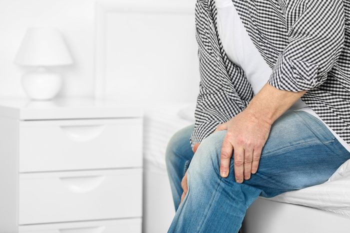 Mature man suffering from leg pain