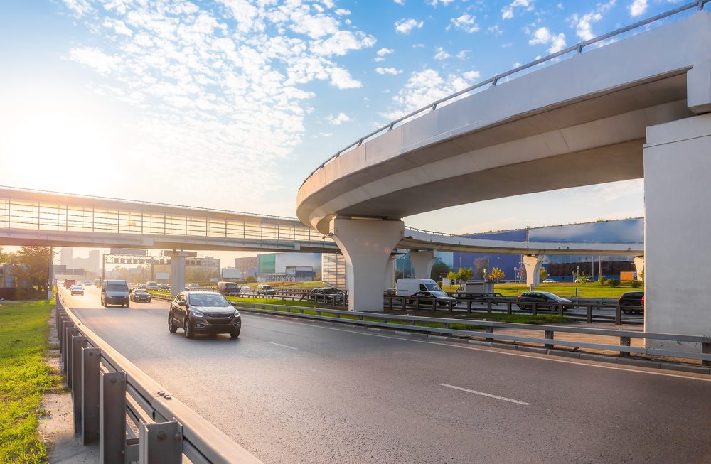 Highway interchange with bridge on the background