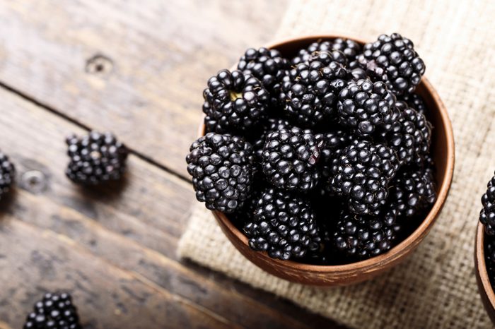 Blackberry on a wooden background