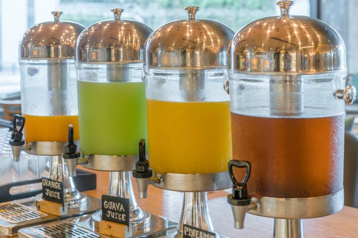 Row of fresh juice at buffet restaurant.