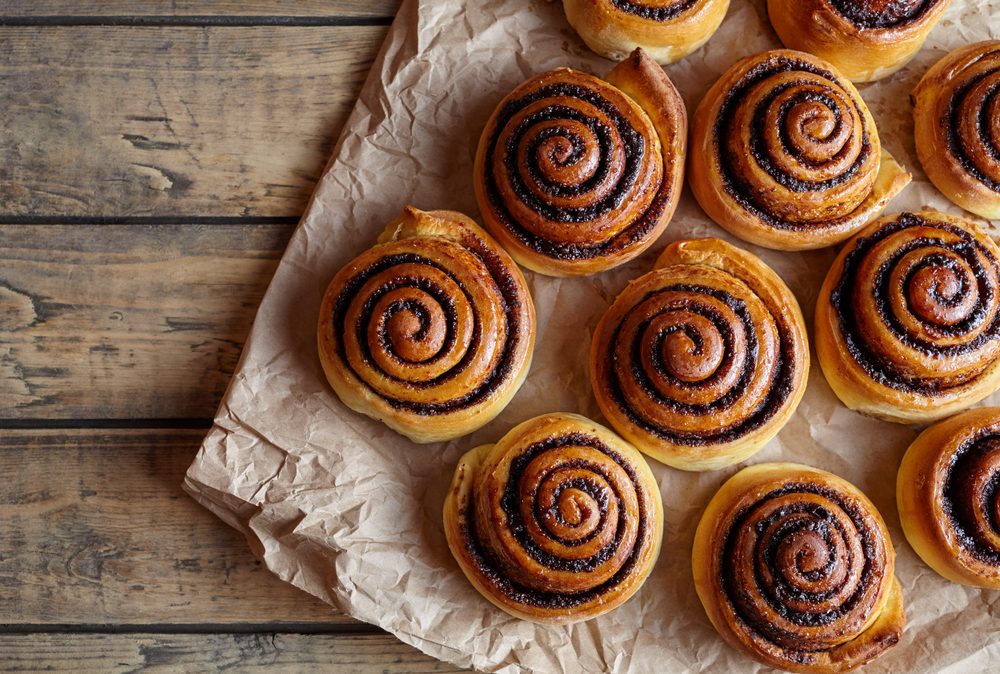 Freshly baked cinnamon buns with spices and cocoa filling