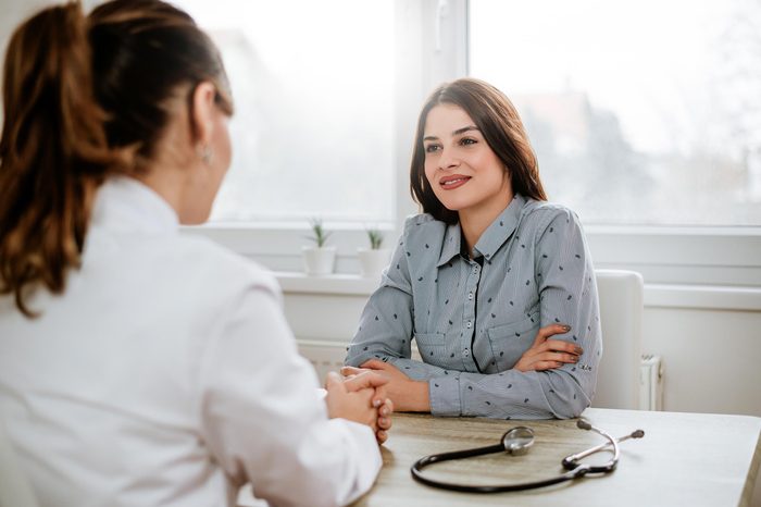 woman doctor patient appointment talk