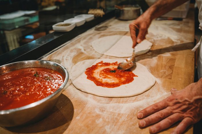 pizza chef preparing pizza