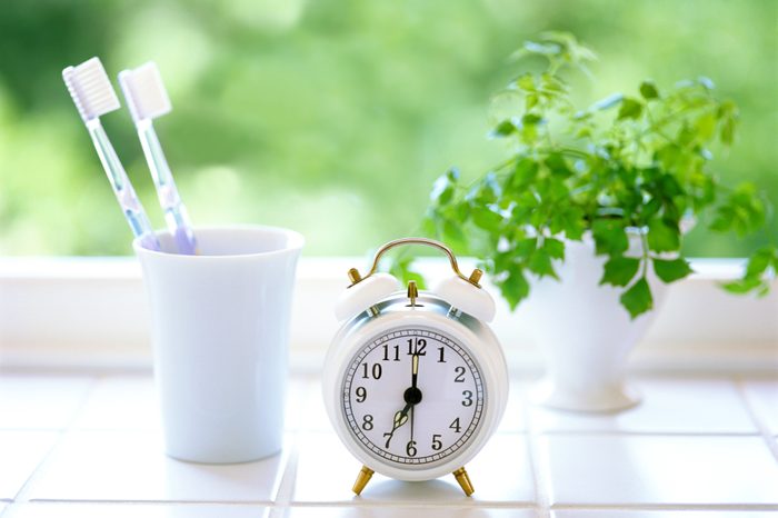 alarm clock and toothbrushes