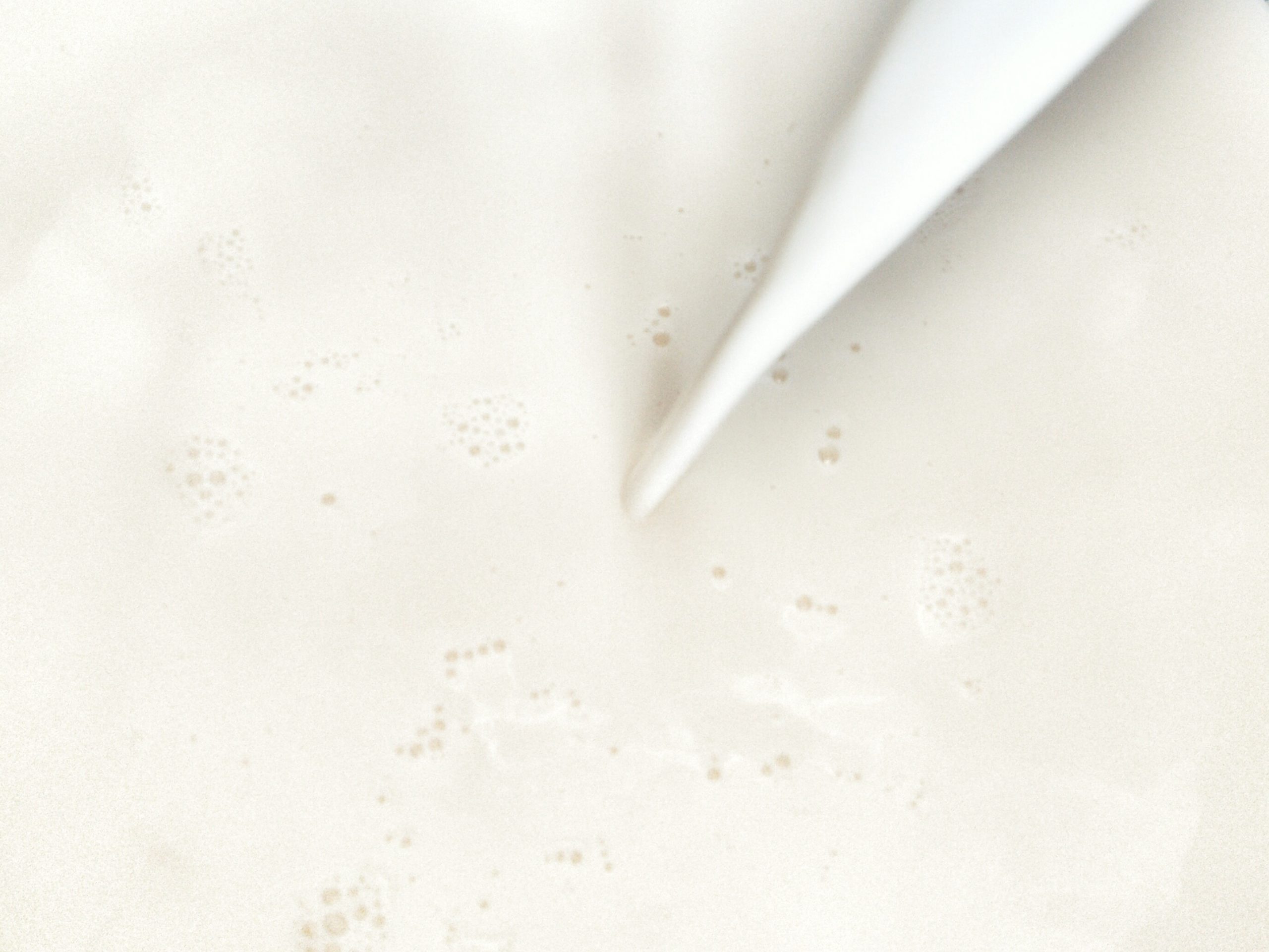 Full Frame Shot Of Milk Being Poured