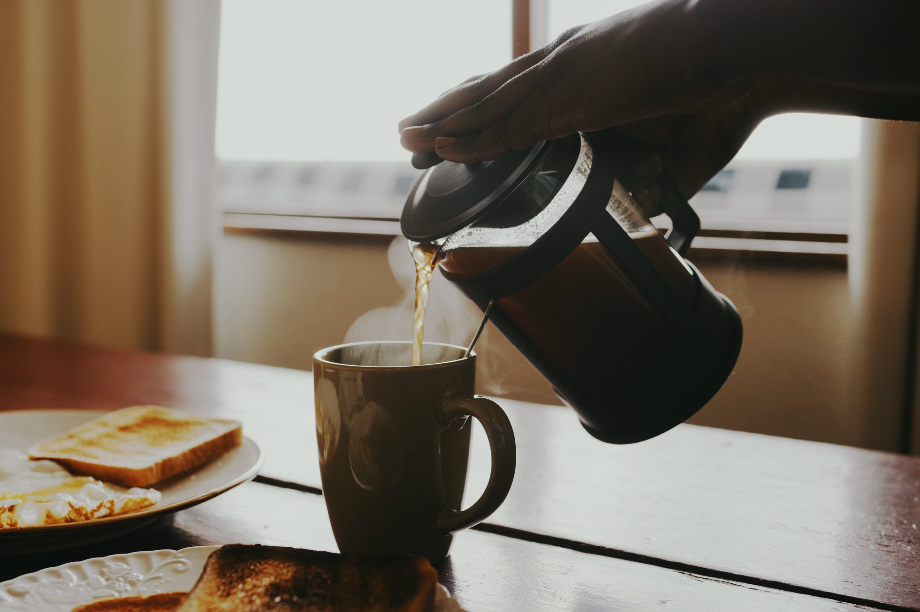 pouring cup of coffee