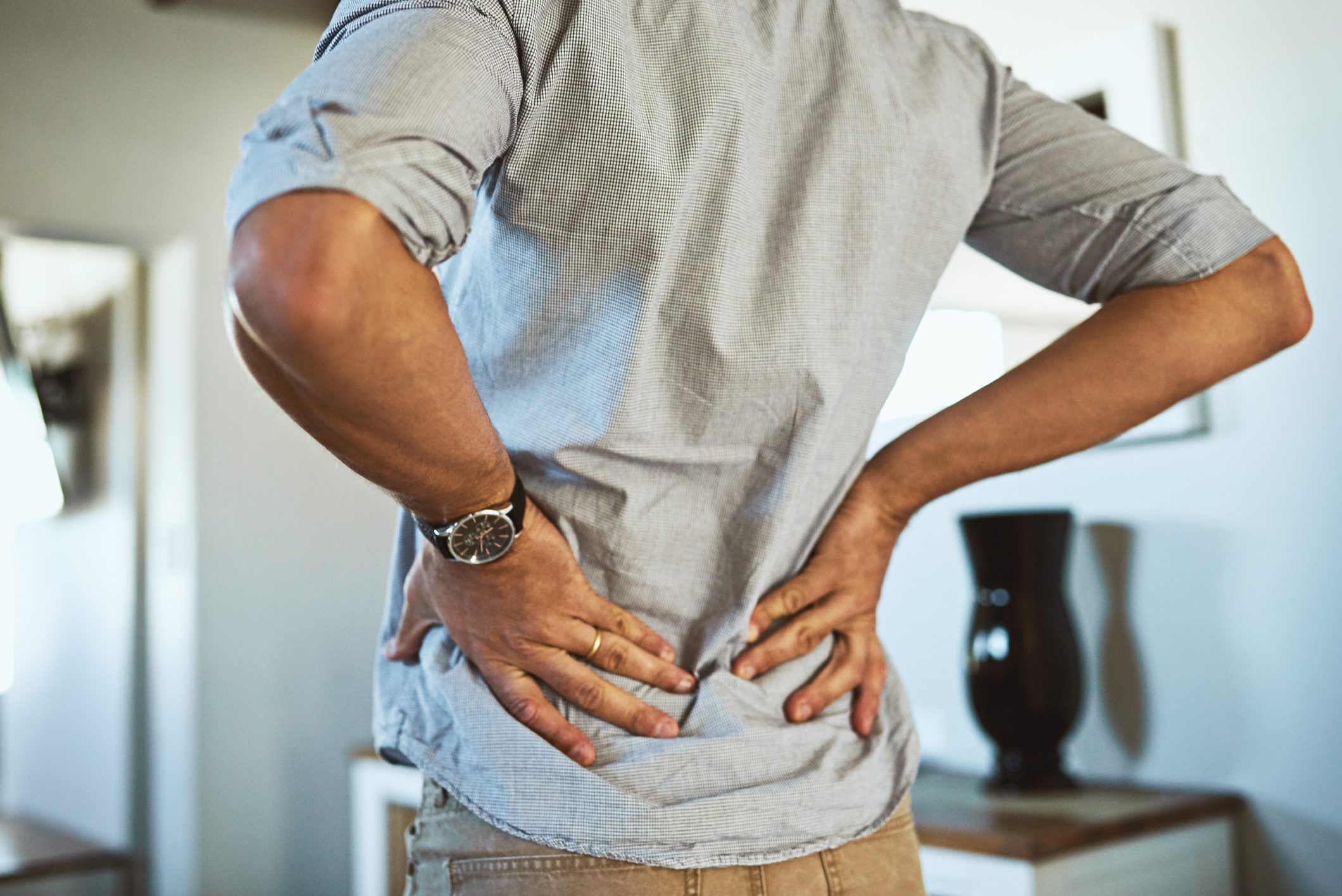 lower back pain and stretch close up