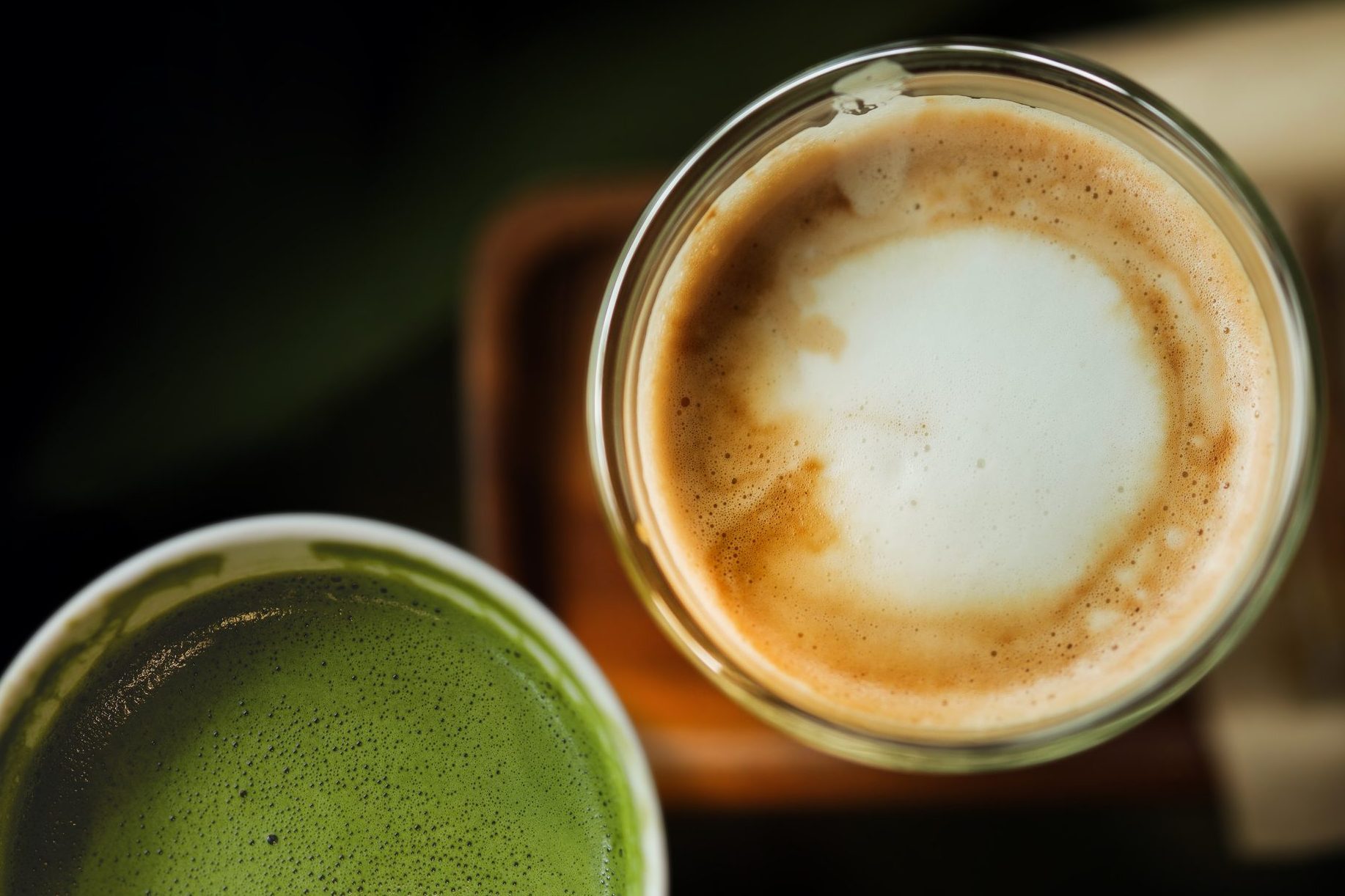 High Angle View Of Coffee And Juice On Table