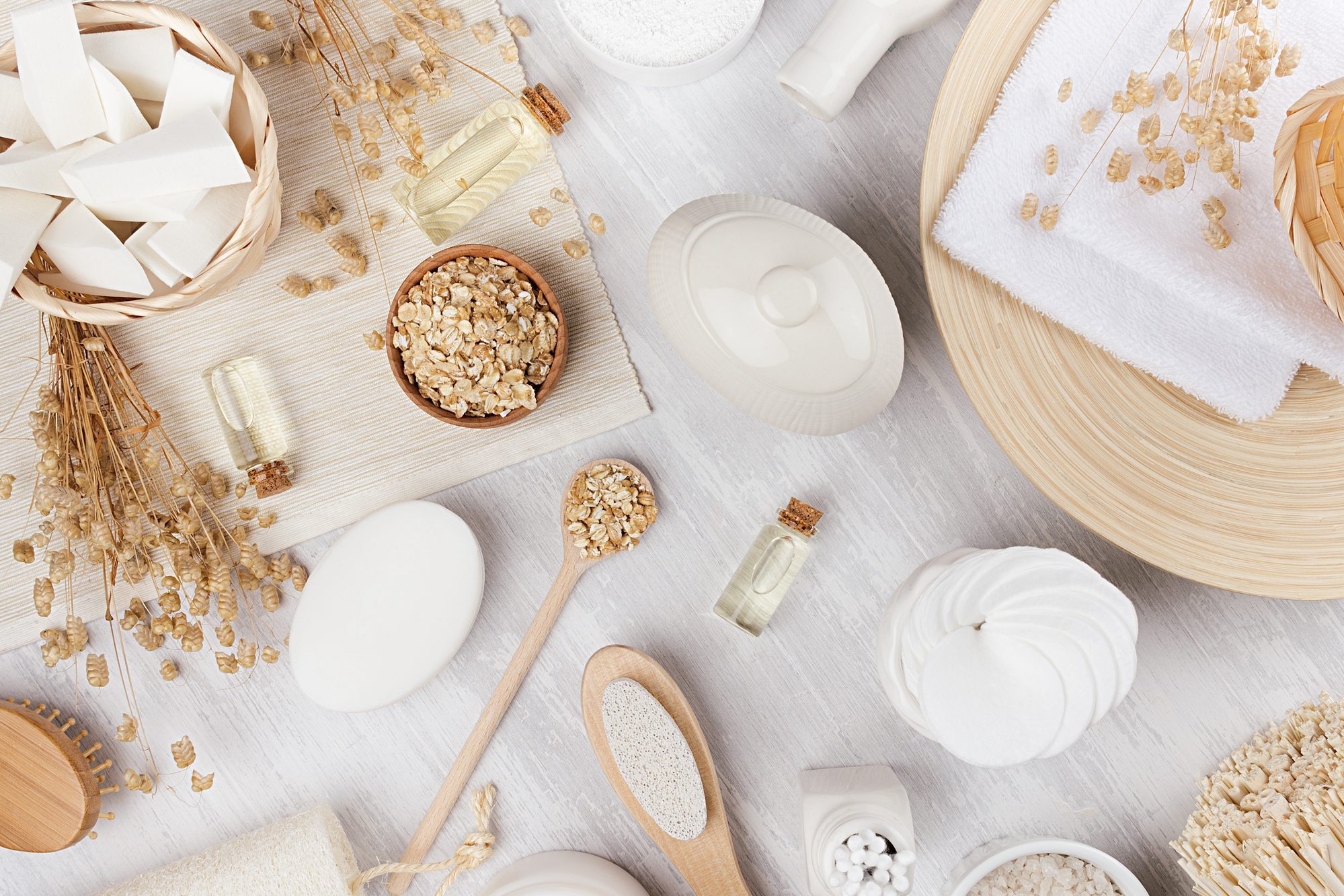 oatmeal bath products on gray background