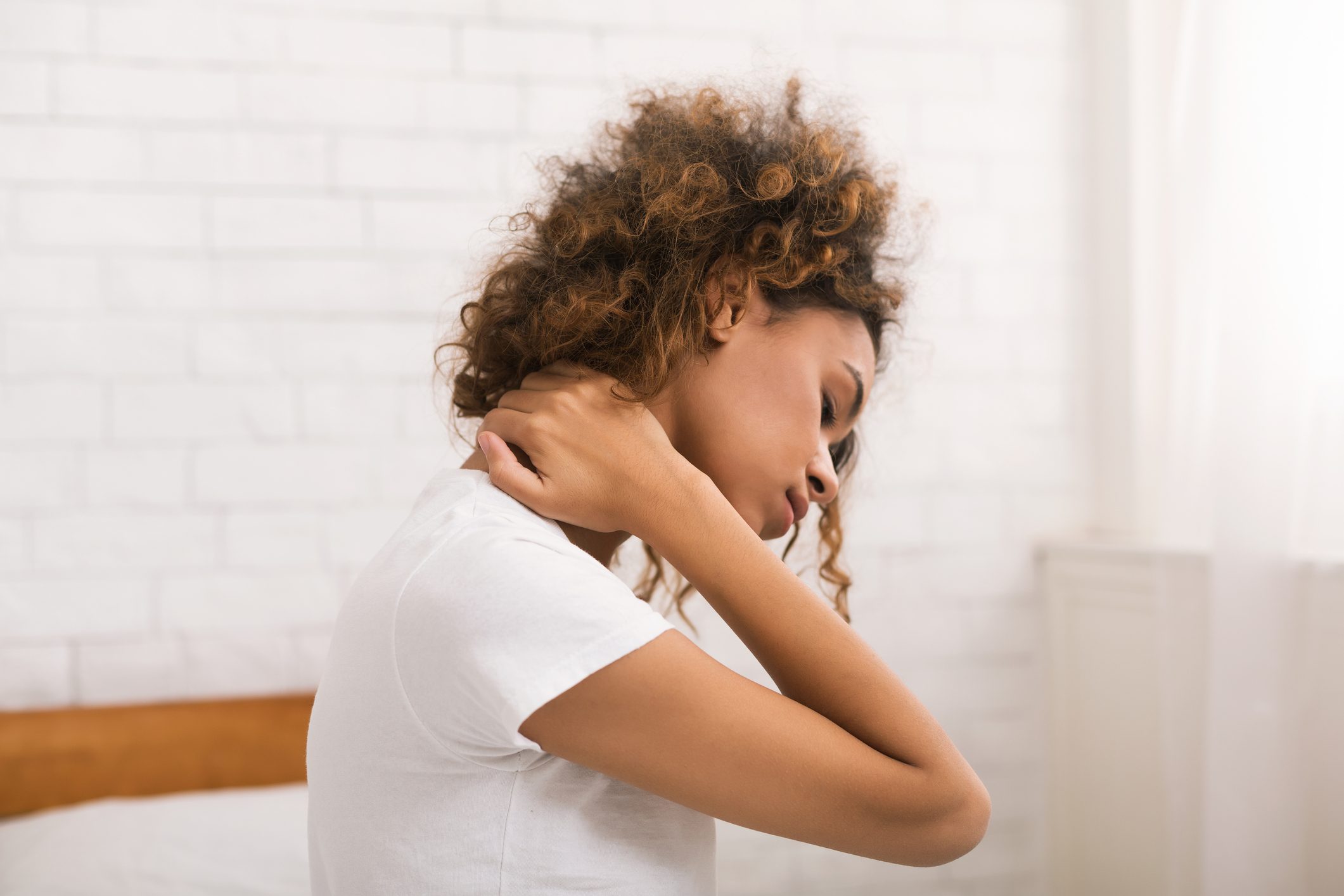 Banish Neck Pain With These 5 Simple Stretches