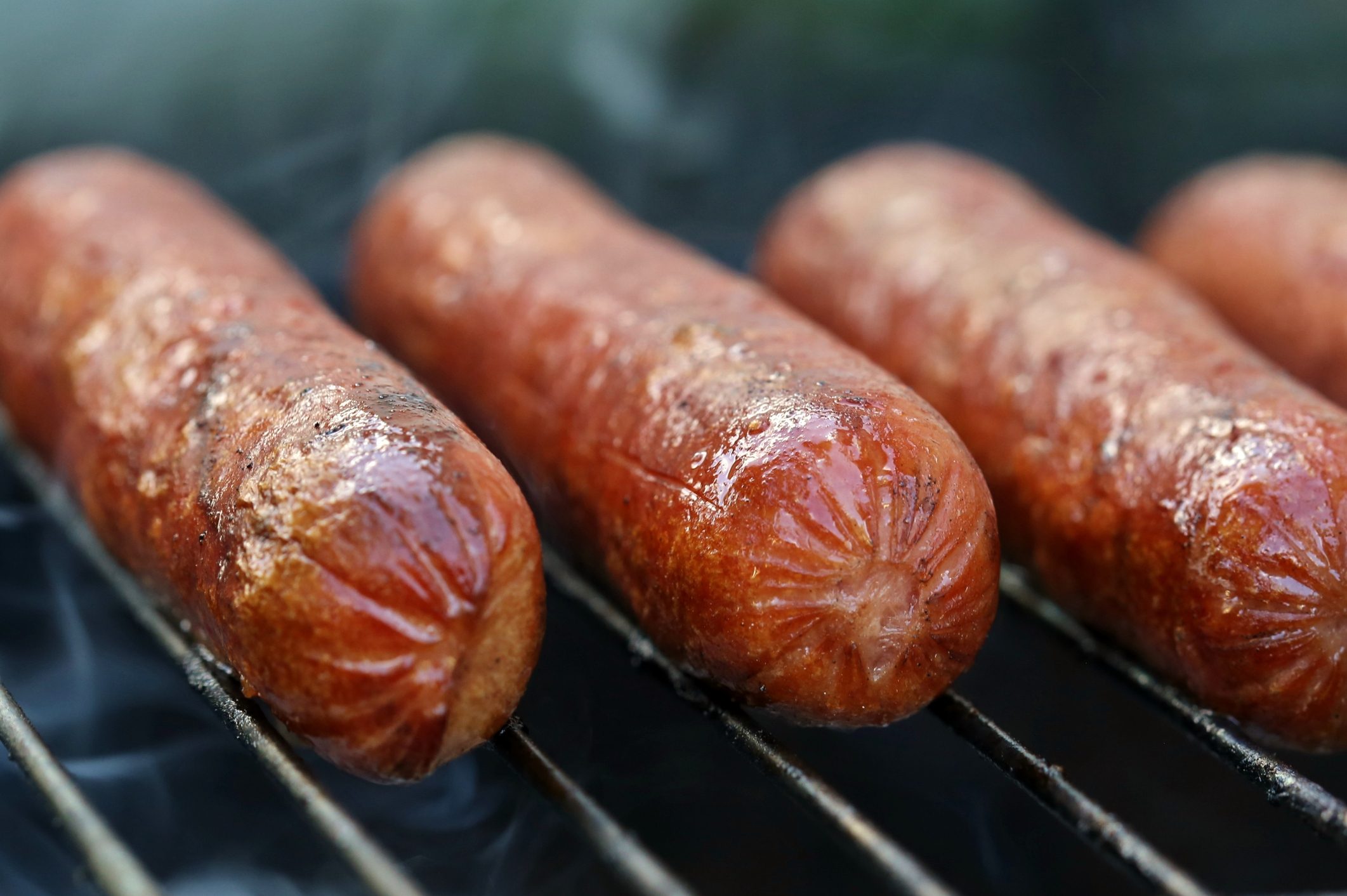 Hot dogs on the grill in the summer time